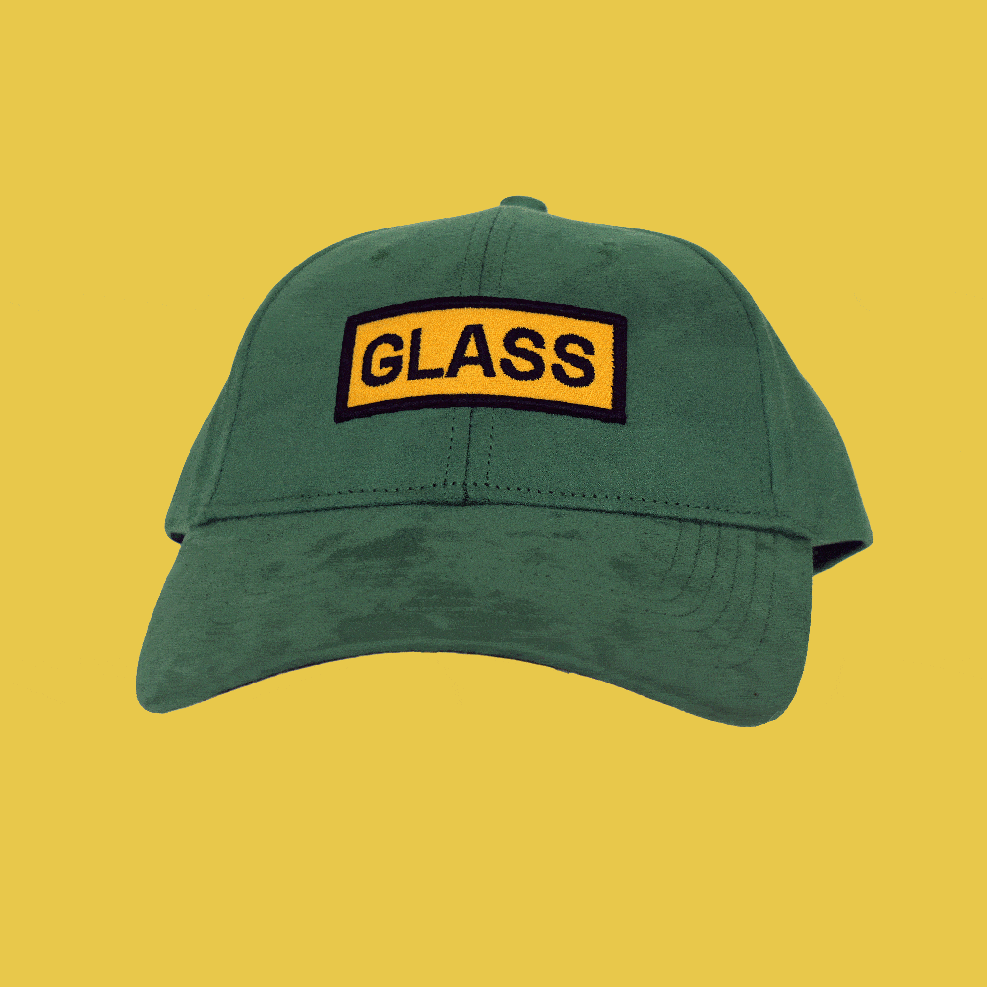 360-degree spinning view of bABP "GLASS" green eco-suede hat with vibrant yellow and black embroidery, Signature Collection, showing premium texture and structured fit